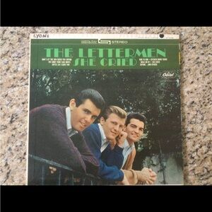 The Lettermen "She Cried LP.  I played it this morning.  Plays great.